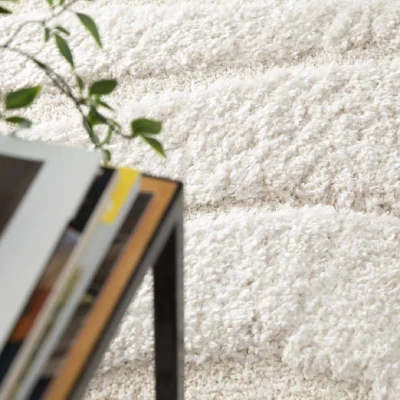 tapis interieur motif shaggy relief blanc Idées cadeaux déco pour tous les budgets